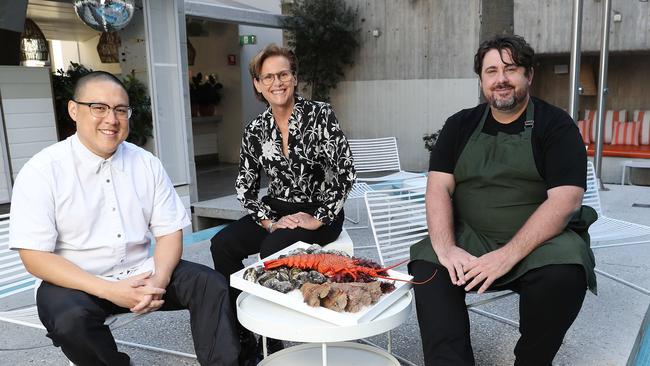 Mr Hong, Mr Eggert and Ms Minervini with fresh seafood which will be served at the dinner. Picture: David Swift