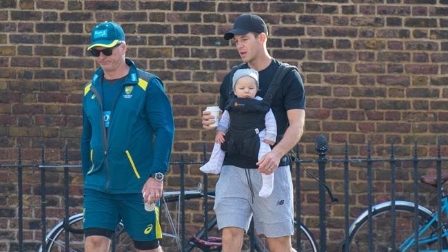 Former Australian cricket captain Steve Waugh with current captain Tim Paine and his baby in London yesterday. Picture: Backgrid