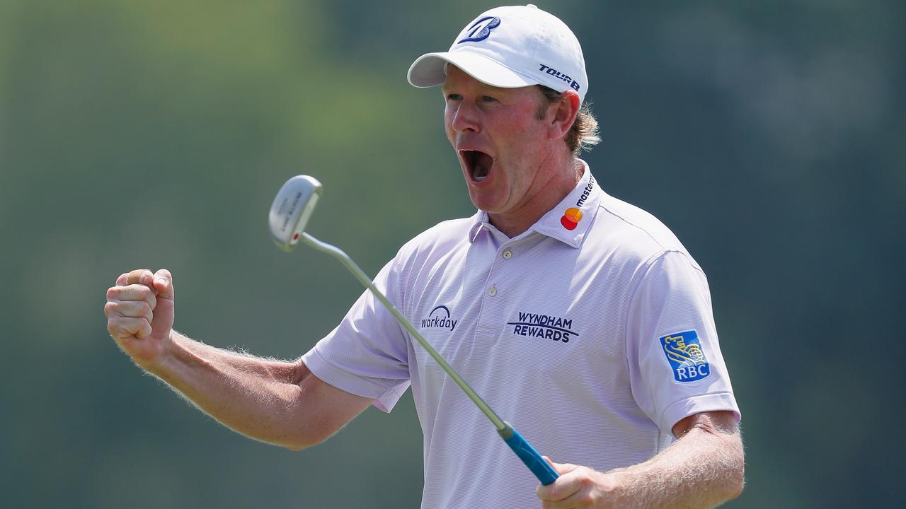 Brandt Snedeker reacts following a birdie putt on the ninth green.