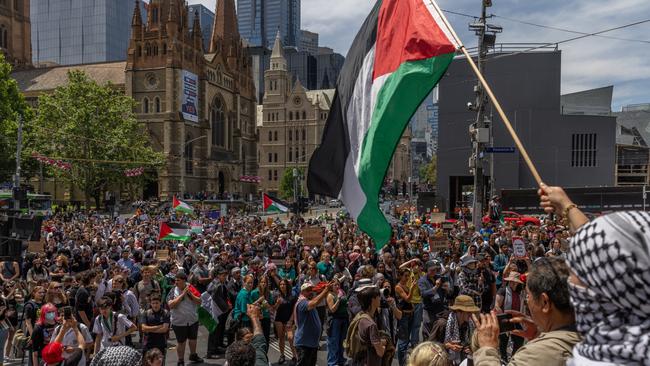 Protesters at Flinders Street Station.