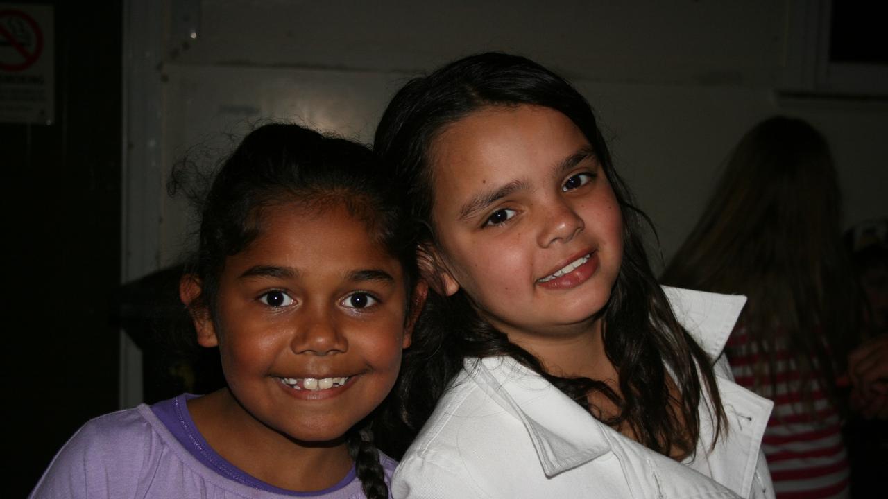 Grace Collins and Elouise Close pal up at the Blue Light Disco. Photo Deanna Millard / Warwick Daily News