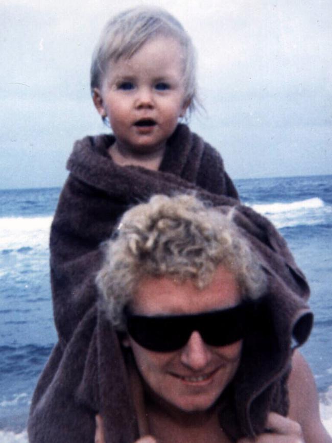 The artist with the couple’s daughter Arkie in a picture from his sister Frannie Hopkirk’s book Brett: A Portrait Of Brett Whiteley.