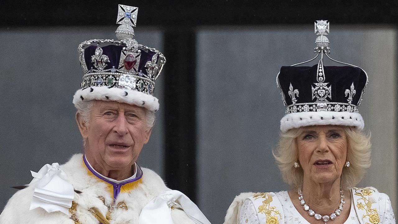 King Charles III and Queen Camilla seen on the Buckingham Palace balcony during the fly-past for the Coronation of King Charles III and Queen Camilla on May 6, 2023. Picture: Christopher Furlong/Getty Images