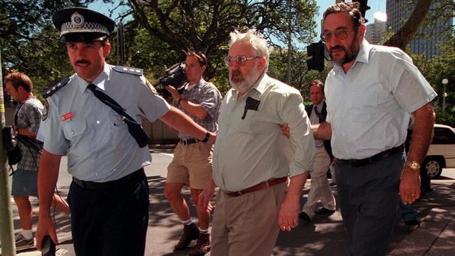 Aaron Govendir is helped by an officer as he leaves Sydney Police Centre where he appealed for help from the public in the murder of his wife Denise 11/03/98, who was bludgeoned to death in their Dover Heights home, 10/03/98 by intruders.NSW / Murder