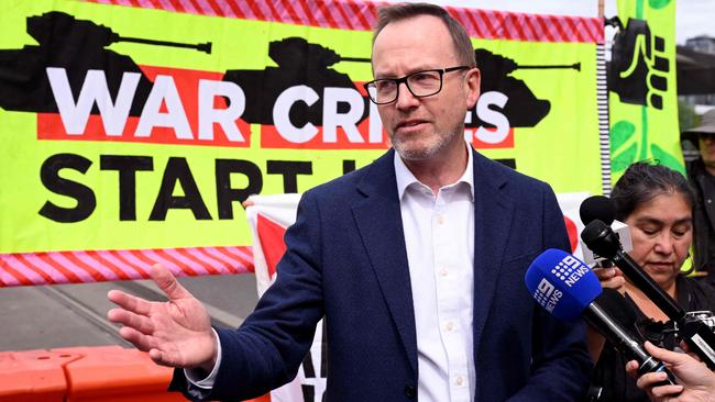 Greens senator David Shoebridge speaks to protesters and the media outside the Land Forces 2024 arms fair in Melbourne on September 13. Picture: AFP