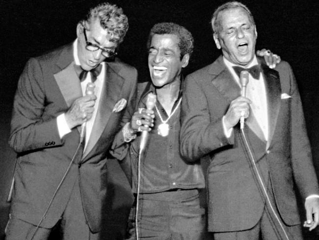 Actor and singer Sammy Davis Junior with Dean Martin and Frank Sinatra during a concert in 1978.