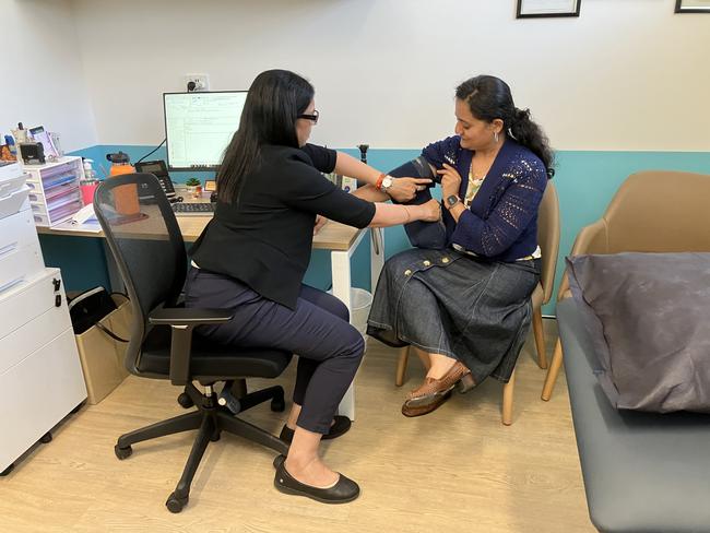 Mount Louisa Medical Centre GP Dr Richa Dua consults with a patient. Picture: Supplied.