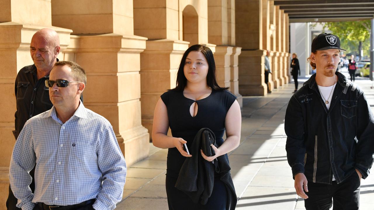 Family members of victims Sherril Pountney and Patricia Phillips are seen outside the Adelaide Supreme Court on Thursday, April 5, 2018. Picture: AAP Image/David Mariuz