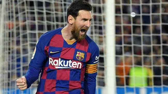 Barcelona's forward Lionel Messi celebrates after scoring against Real Sociedad.