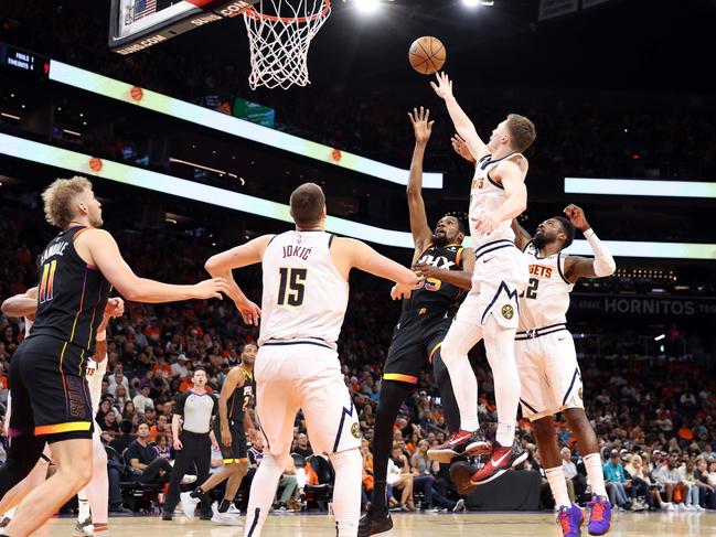 PHOENIX, ARIZONA - MAY 11: Kevin Durant #35 of the Phoenix Suns shoots the ball during the fourth quarter against the Denver Nuggets in game six of the Western Conference Semifinal Playoffs at Footprint Center on May 11, 2023 in Phoenix, Arizona. NOTE TO USER: User expressly acknowledges and agrees that, by downloading and or using this photograph, User is consenting to the terms and conditions of the Getty Images License Agreement.   Christian Petersen/Getty Images/AFP (Photo by Christian Petersen / GETTY IMAGES NORTH AMERICA / Getty Images via AFP)