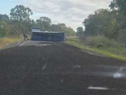 A truck crash on the Bruce Highway near Flaggy Rock on August 1, 2024, spread what is believed to be fertiliser across the highway, with the truck blocking both lanes. Picture: Facebook