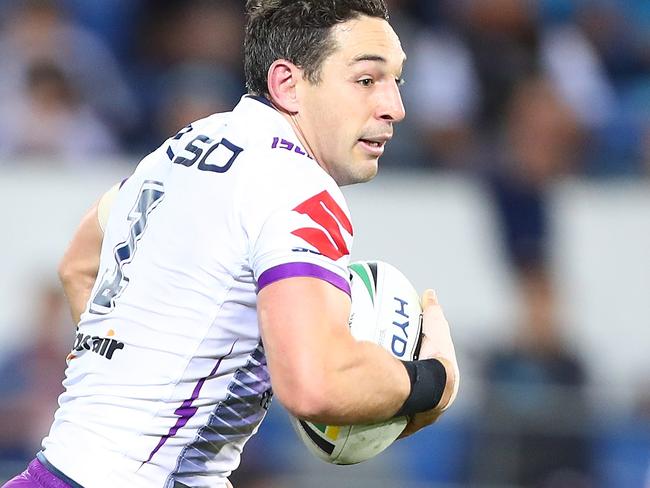 GOLD COAST, AUSTRALIA - AUGUST 25:  Billy Slater of the Storm makes a break during the round 24 NRL match between the Gold Coast Titans and the Melbourne Storm at Cbus Super Stadium on August 25, 2018 in Gold Coast, Australia.  (Photo by Chris Hyde/Getty Images)