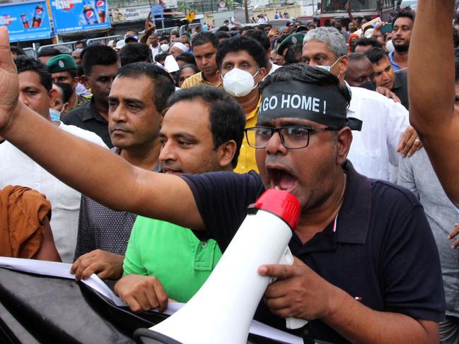 Activists of Sri Lanka's main opposition, shout slogans demanding Sri Lankan President Gotabaya Rajapaksa's resignation amid economic crisis in Colombo on June 30, 2022. (Photo by AFP)