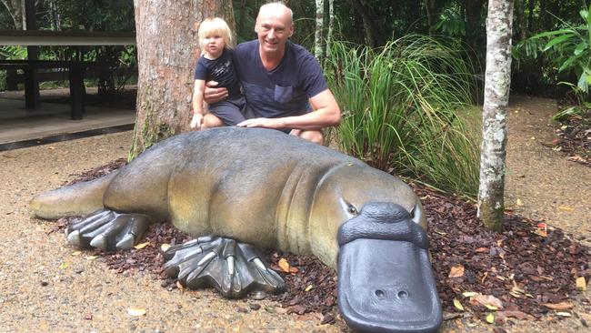 Platypus Lodge Restaurant and Cafe owner Oskar Krobath with his grandchild Elaina at Broken River. Picture: Contributed