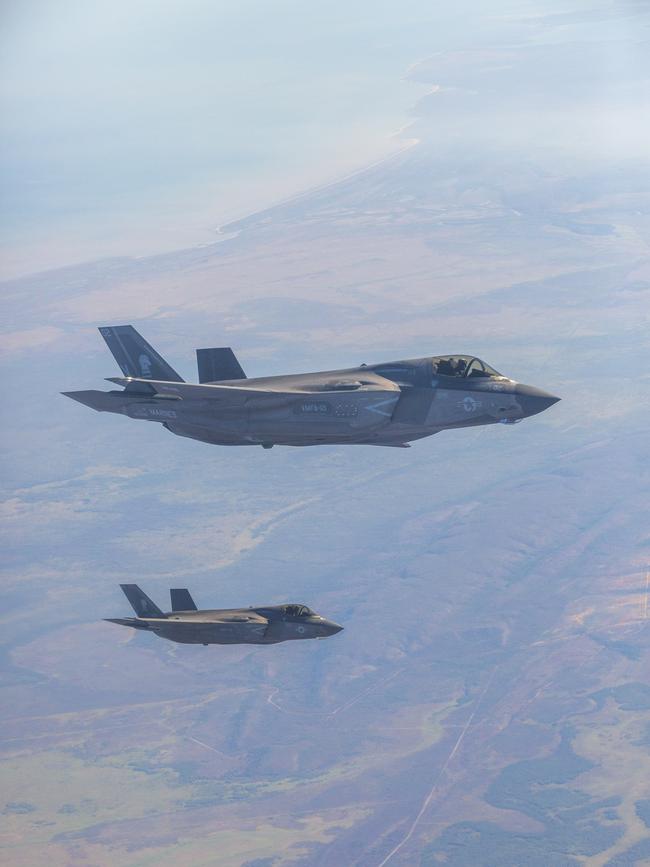 Two US Marine F35 jets fly in unison about 100km south of Darwin. Picture: Floss Adams.