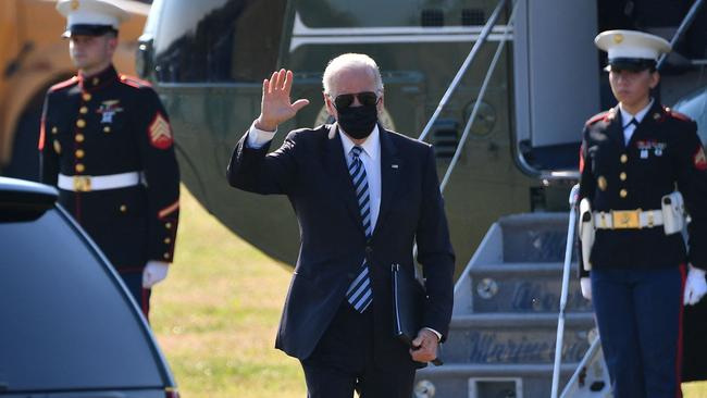 US President Joe Biden waves as he steps off Marine One upon arrival in Milford, Delaware overnight (AEDT). Picture: AFP