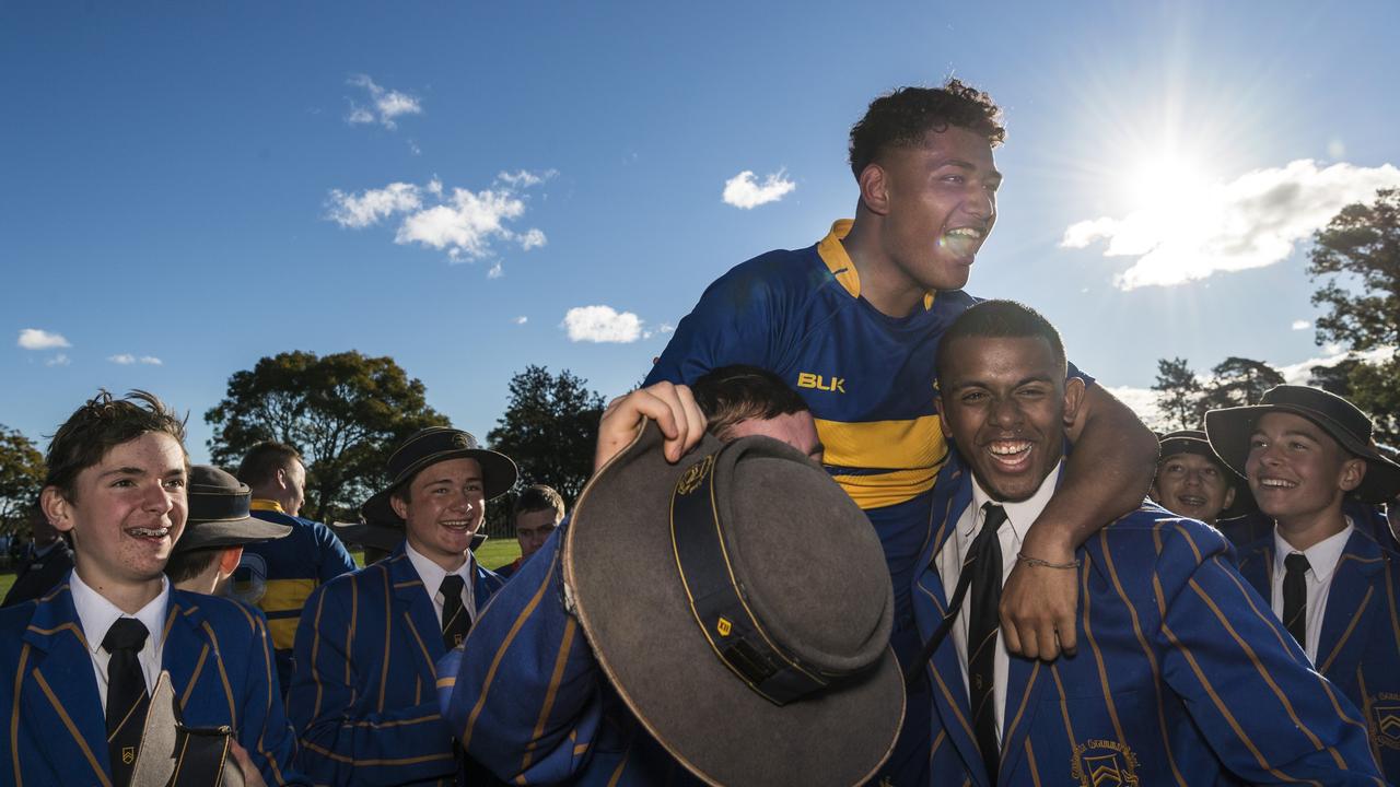 TGS students and players including vice captain Sebastian Sialau celebrate the Grammar win against Downlands in the 2021 O'Callaghan Cup at Toowoomba Grammar School, Saturday, July 24, 2021. Picture: Kevin Farmer