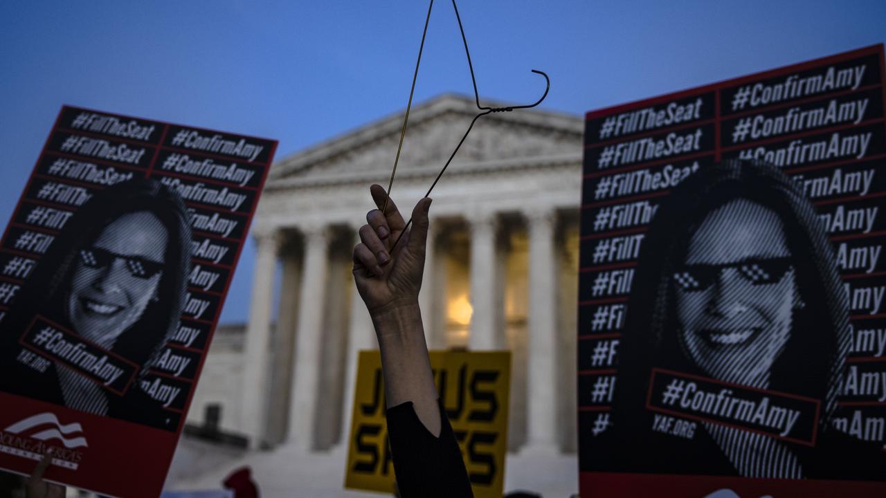 People that both support and oppose the nomination of Judge Amy Coney Barrett demonstrate in front of the Supreme Court of the United States in Washington, DC. Picture: Samuel Corum/Getty Images/AFP