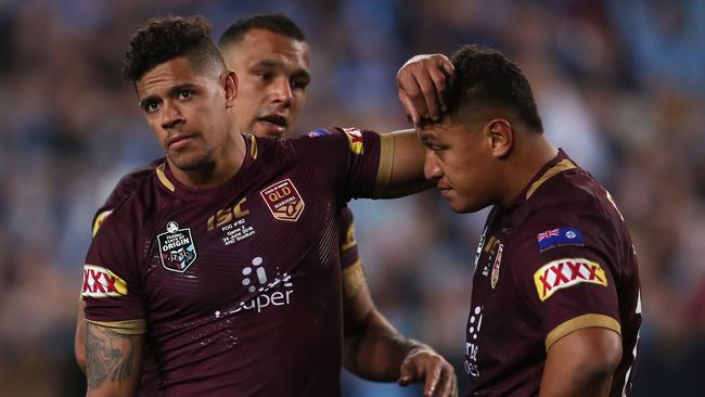 Disappointment ... Queensland players (from left) Dane Gagai, Will Chambers and Josh Papalii come to terms with defeat. Photo: Getty Images