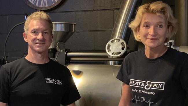 Passionate coffee gurus Gary and Michelle Collard in front of their roaster. Picture: Matt Gazy