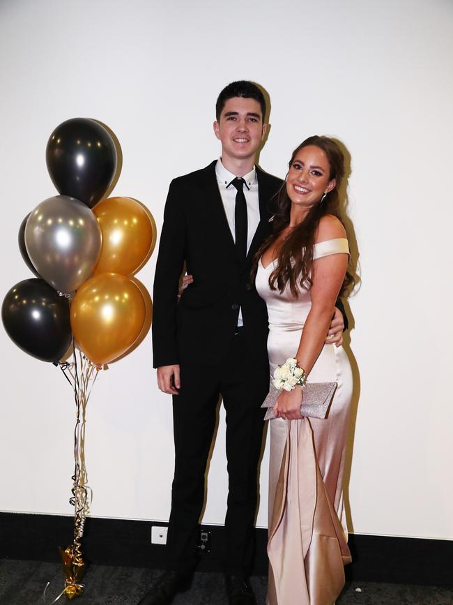Dylan Baxter and Sophie Moss at Trinity Lutheran College formal at Gold Coast Convention and Exhibition Centre. Photograph : Jason O'Brien