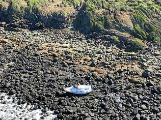 DRAMATIC RESCUE: RACQ Capricorn Rescue search and rescue mission located a 20 foot yacht stuck on Bush Island, north of Stanage Bay, with its two occupants stranded. Picture: RACQ Capricorn Rescue