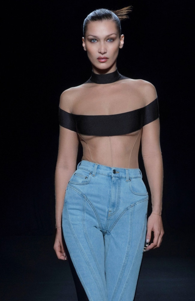 Bella Hadid modelled a ‘duct tape’ style top as it appeared to be strapped around her chest. Picture: Splash