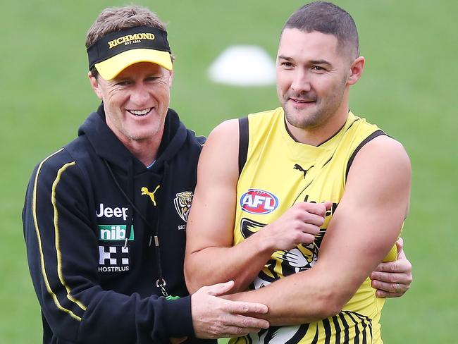 MELBOURNE, AUSTRALIA - MAY 10: Tigers head coach Damien Hardwick hugs Shaun Grigg of the Tigers during a Richmond Tigers AFL training session at Punt Road Oval on May 10, 2019 in Melbourne, Australia. (Photo by Michael Dodge/Getty Images)