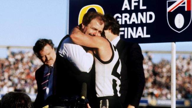 Coach Leigh Matthews and captain Tony Shaw embrace after 1990 Grand Final.