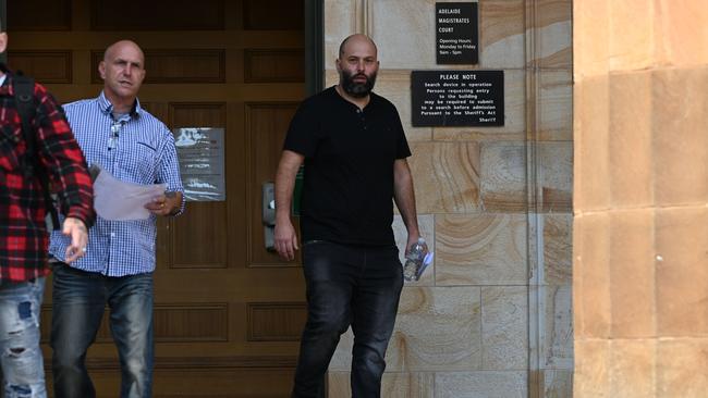 Nikola Necic leaving court after pleading guilty.