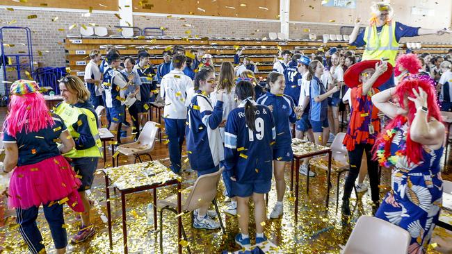 Teachers dressed up and surprised the students with a confetti canon and rock music. Picture: Tim Marsden