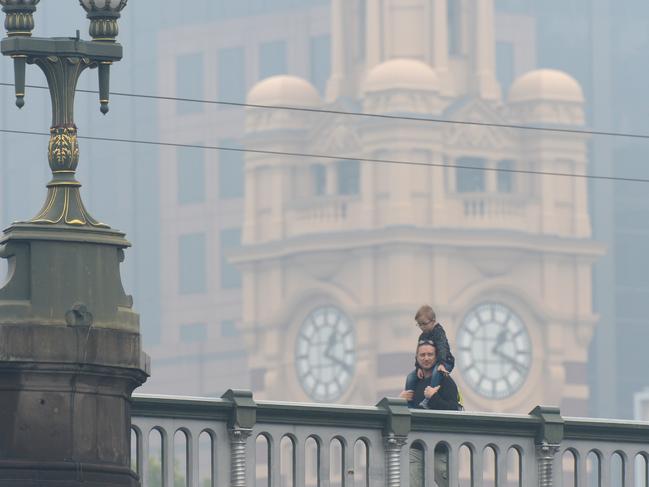 Melbourne blanketed in smoke from the bushfires raging in Gippsland. Picture: Andrew Henshaw