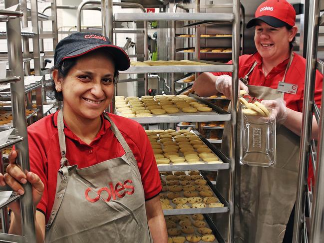 Coles supermarket is opening a new store at Ed.Square in Edmondson Park in Sydney's south west. Bakery staff Vish Shah (L) and manager Jess Riley. Picture: Toby Zerna