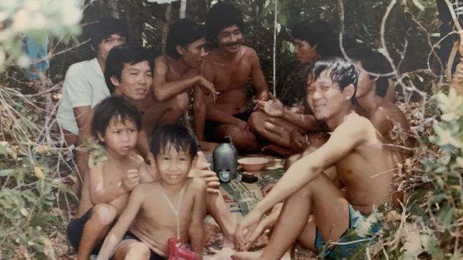 Tien Nguyen, 8, in foreground at the Galang Island Refugee Camp, Indonesia in 1984 with other Vietnamese refugees waiting for asylum. Picture: Ngon Ha