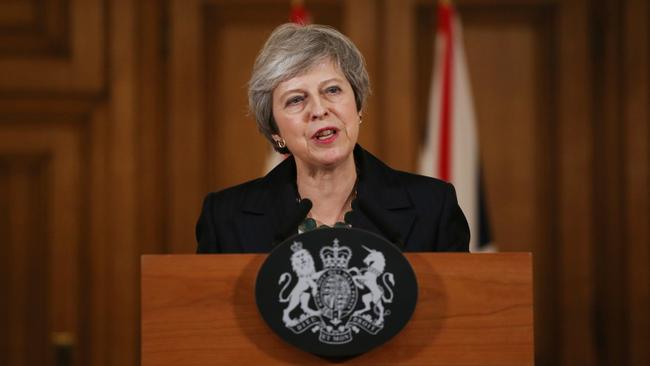 Britain's Prime Minister Theresa May speaks during a press conference inside 10 Downing Street overnight.