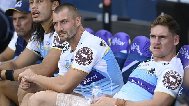 AJ Brimson and Kieran Foran of the Titans sit on the bench after being injured during the round four NRL match between North Queensland Cowboys and Gold Coast Titans at Qld Country Bank Stadium on March 25, 2023 in Townsville, Australia. (Photo by Ian Hitchcock/Getty Images)