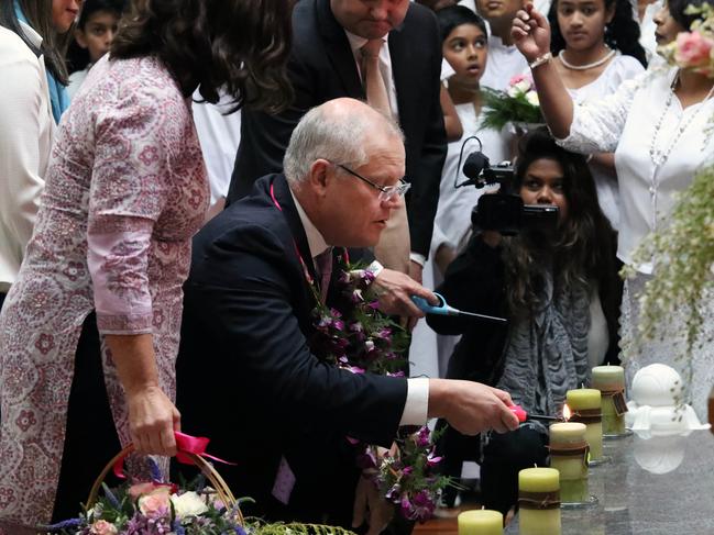 Scott Morrison and his wife Jenny during a visit to the Berwick Temple in Melbourne. Picture Gary Ramage