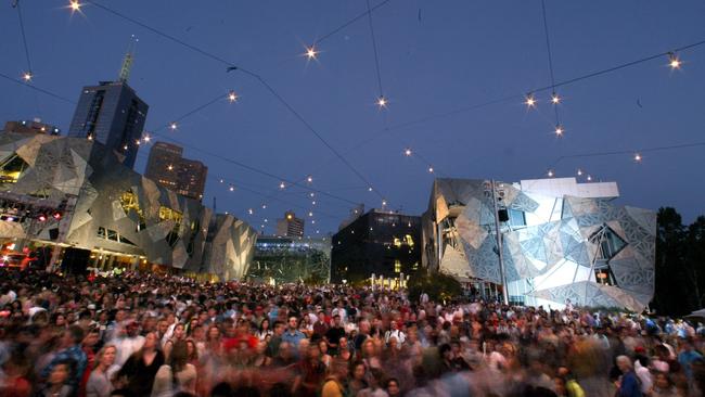 New Year’s Eve revellers at Federation Square in 2013.