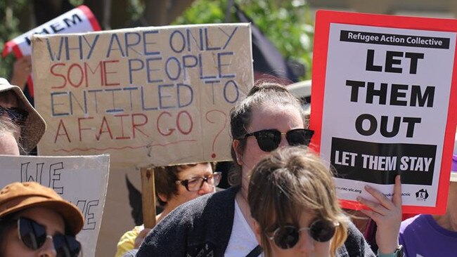 Supporters held signs calling for the men to be released. Picture: Supplied