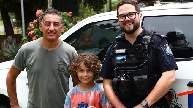 Dad Kutz Ali, son Rykin and Constable Liam Knox.