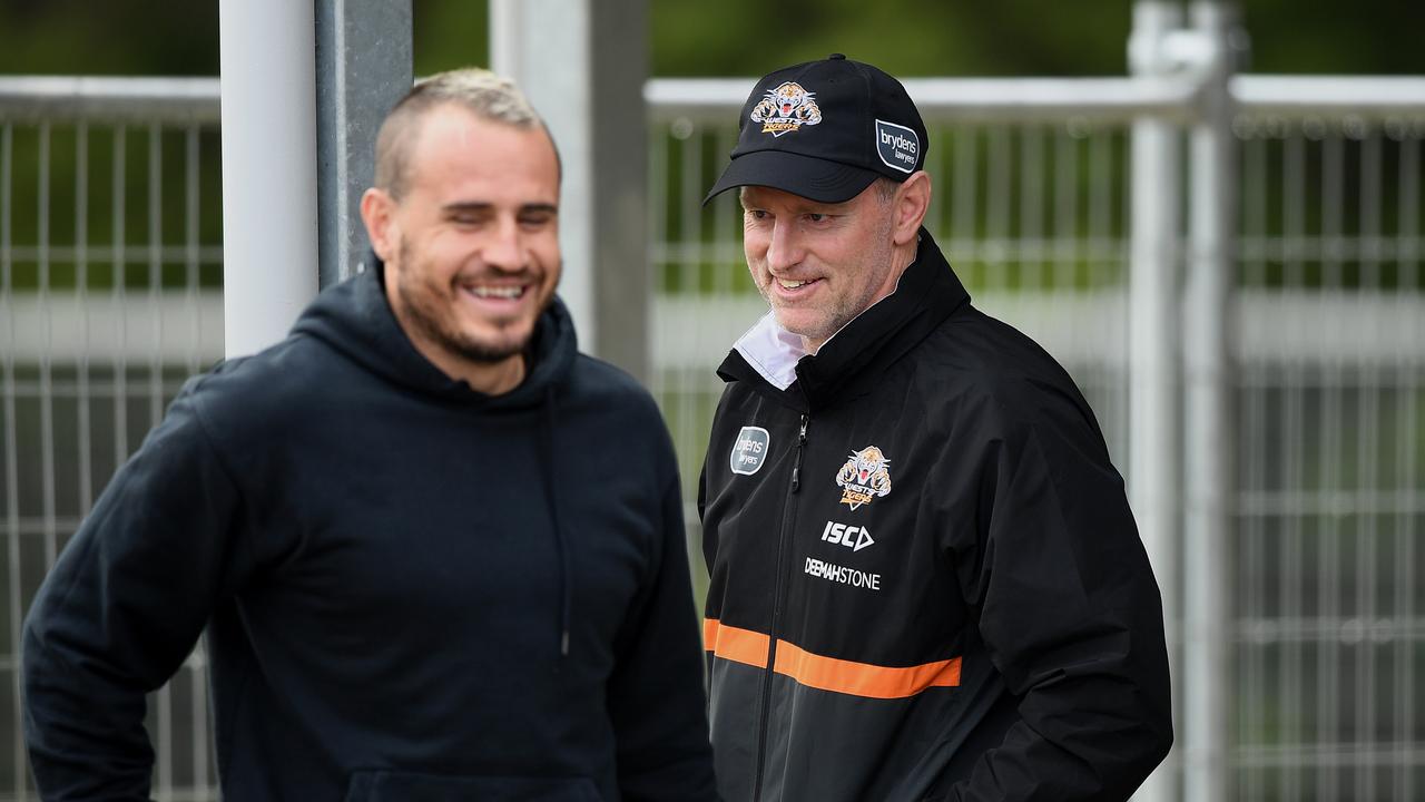 Josh Reynolds (left) and Tigers coach Michael Maguire during a Wests Tigers NRL training session in Sydney, Wednesday, June 10, 2020. (AAP Image/Joel Carrett) NO ARCHIVING