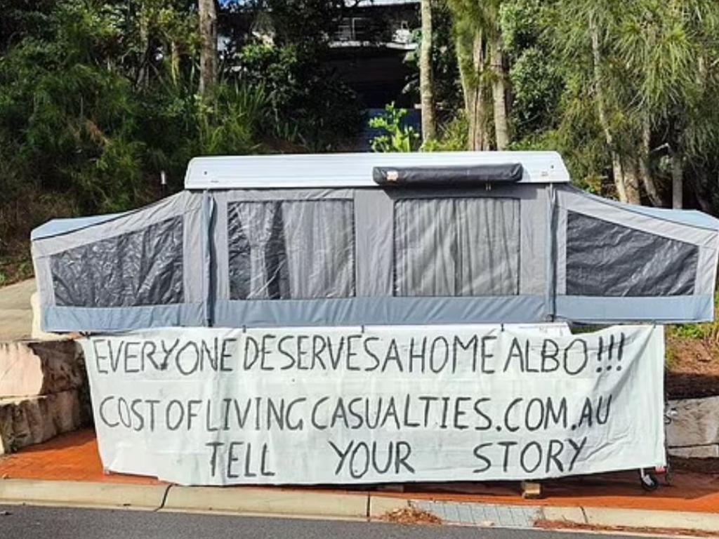Mr Cox camped outside of the PM’s Central Coast mansion with this message on his tent. Picture: X