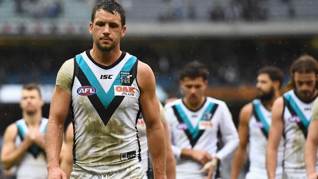 Port Adelaide captain Travis Boak walks off the MCG on Saturday with his team having lost control of its destiny after dramatically entering free fall against Collingwood. The Power’s past six weeks have highlighted concerning and long-running trends with a team that has gone backwards. Picture: Quinn Rooney (Getty Images)