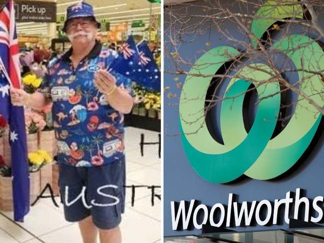 Man hands out flags outside Woolworths. Picture: Facbeook