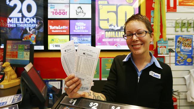 Hobart City Lotto staff member Jaana Jarrad waiting for a lucky punter to claim their prize. Picture: MATT THOMPSON