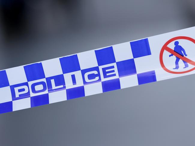 Generic image of police tape outside a crime scene on William Street in the Melbourne CBD on Wednesday, February 5, 2020. (AAP Image/James Ross) NO ARCHIVING