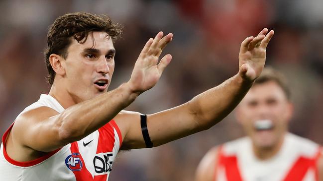 MELBOURNE, AUSTRALIA - MARCH 15: Sam Wicks of the Swans celebrates a goal during the 2024 AFL Round 01 match between the Collingwood Magpies and the Sydney Swans at the Melbourne Cricket Ground on March 15, 2024 in Melbourne, Australia. (Photo by Dylan Burns/AFL Photos via Getty Images)