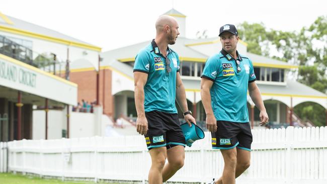 Heat skipper Chris Lynn talks shop with de Villiers ahead of Tuesday’s BBL clash with Adelaide Strikers at the Gabba. Photo Lachie Millard