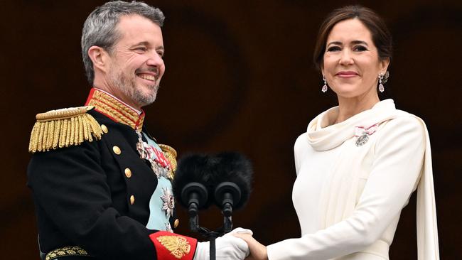 King Frederik X and Queen Mary on the balcony of Christiansborg Palace in Copenhagen. Picture: AFP