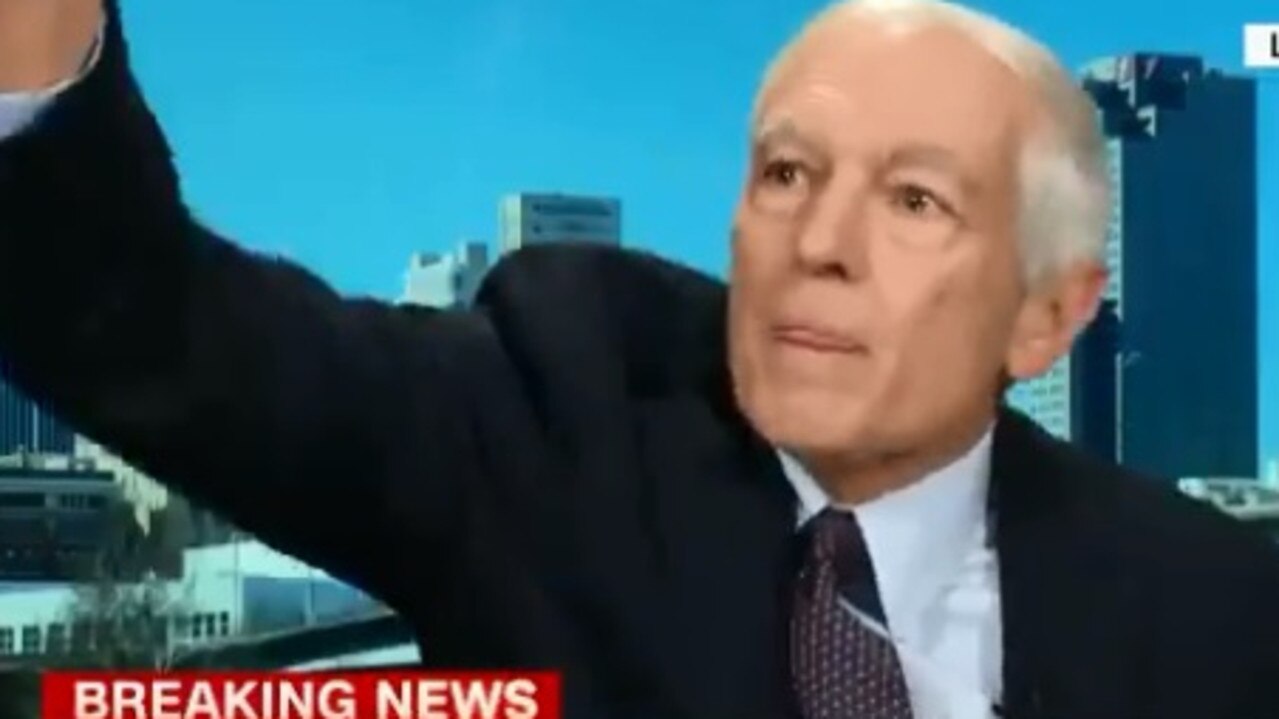 General Wesley Clark flung his mobile phone across the room during a live interview. Picture: Twitter/@brianstelter